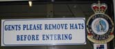 [Sign Gentlemen Remove Hats]