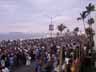[View of crowd looking down from balcony]